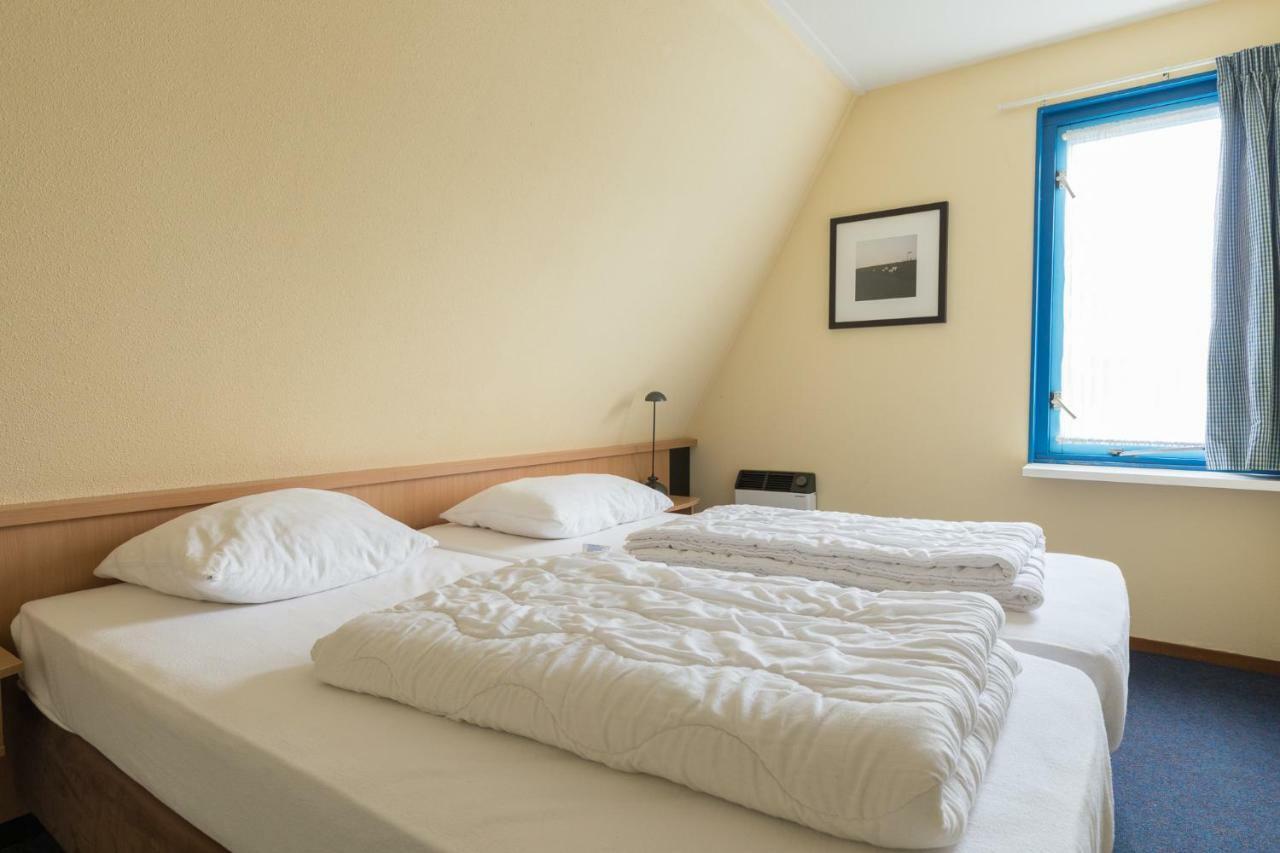 Appartement De Vrijbuiter, Resort Amelander Kaap Холум Екстериор снимка